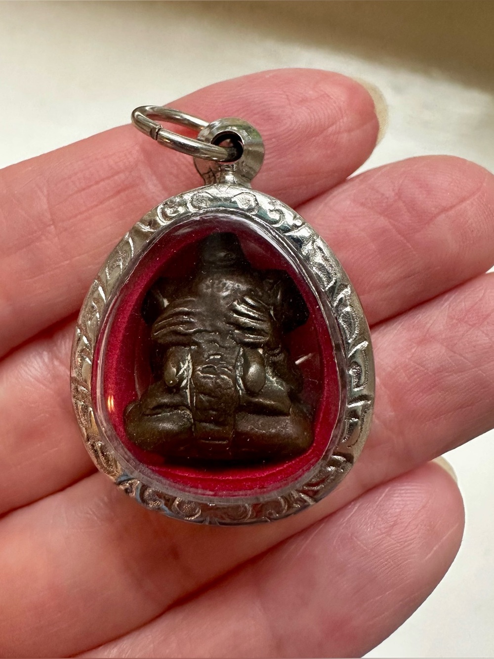 Silver-Frame Red Amulet Charm from Thailand with bronze or metal Lord Ganesha